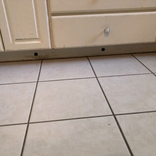 TILE & BASEBOARD DAMAGE